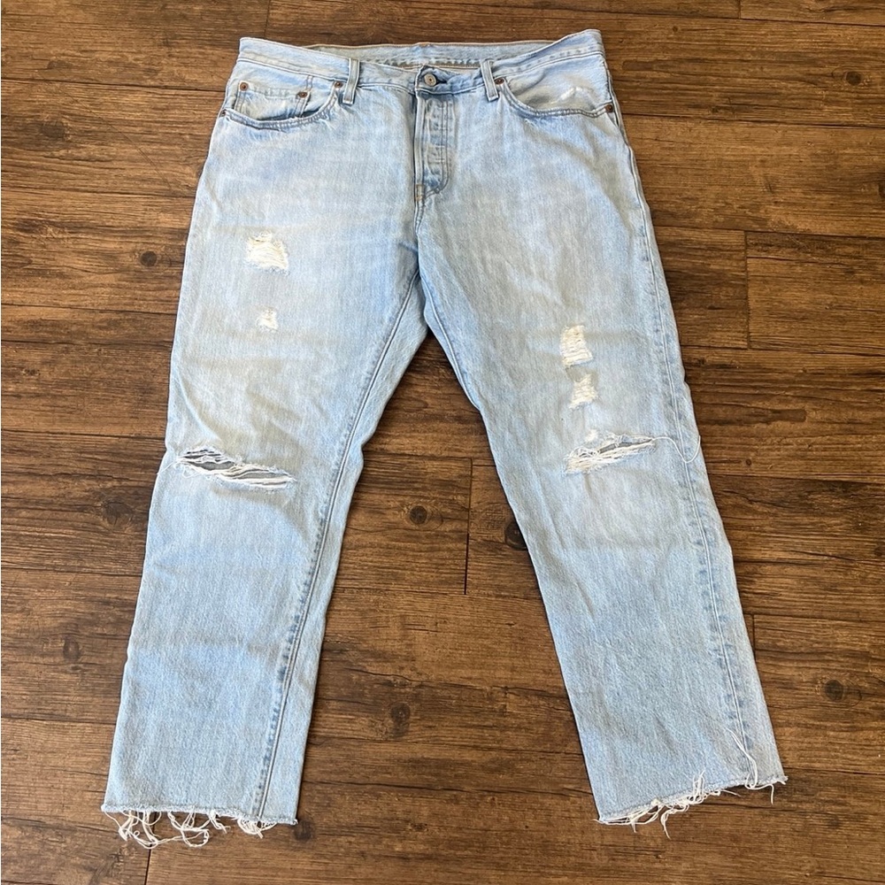 Levi's Relaxed Blue Distressed Jeans with Frayed Hem